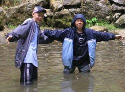 Open water swimmer in cagoule anorak and hoodie