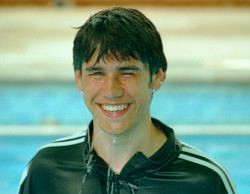 Swimming Training in Tracksuit